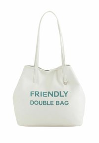 Hvid læder tote bag med to håndtag, prydet med stor turkise tekst der står "VENLIG DOBBELT TASK." Glat tekstur med et minimalistisk design.