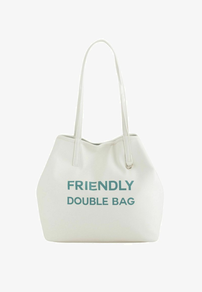 White leather tote bag with two handles, featuring large turquoise text that reads "FRIENDLY DOUBLE BAG." Smooth texture with a minimal design.