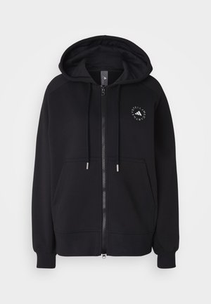 Svart zip-up hettegenser med snorhette, kengurulommer og et sirkulært logo på venstre bryst. Mykt stoff og ribbede mansjetter.