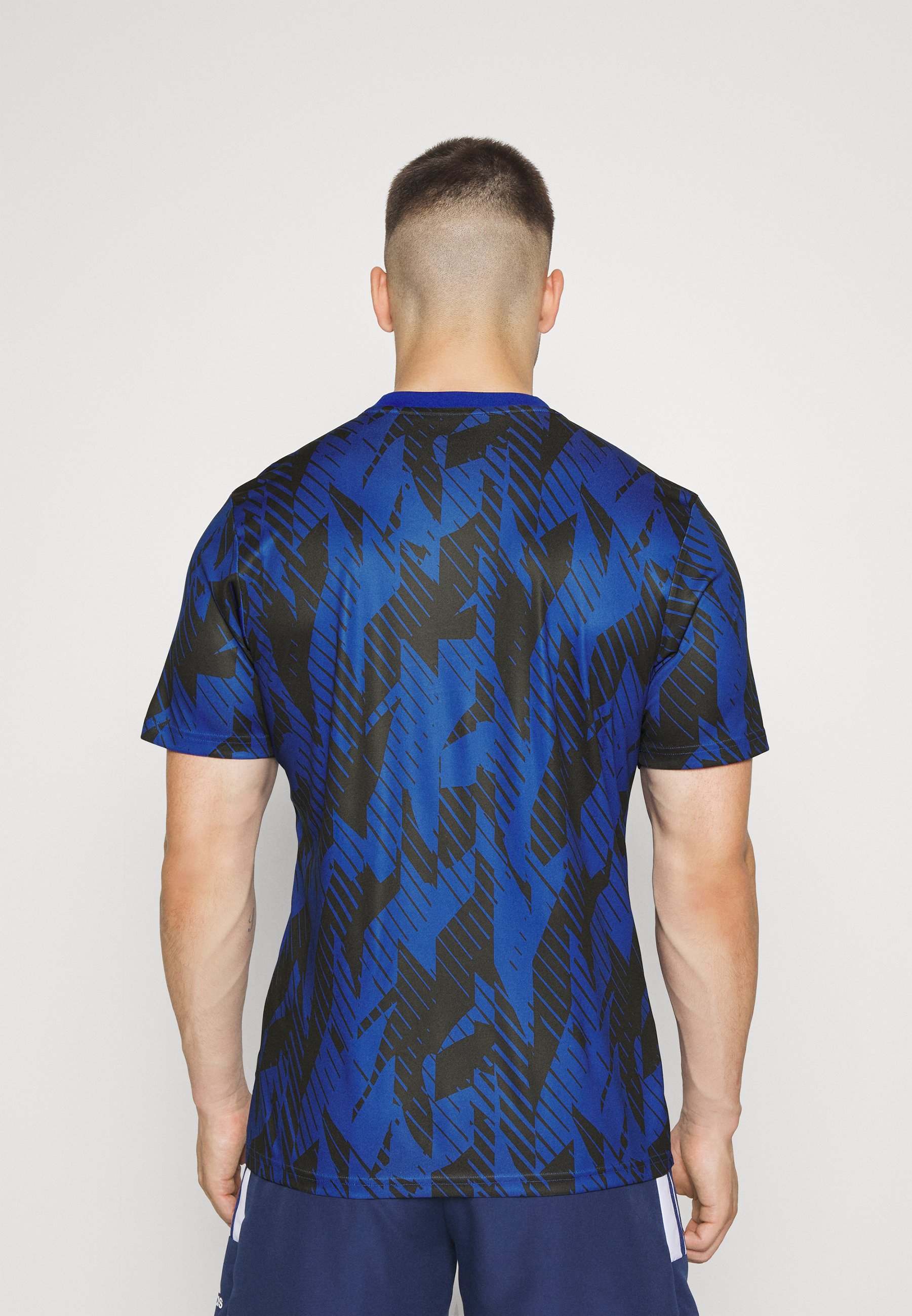 blue adidas football shirt