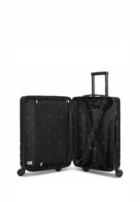Valise rigide noire avec une poignée télescopique et quatre roues. L'intérieur présente une doublure en tissu à motifs et des sangles croisées pour sécuriser le contenu.