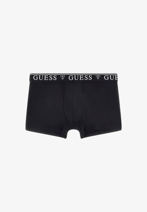 Black boxer briefs made of soft fabric with a snug fit. The waistband features "GUESS" logo in white and a triangular accent.