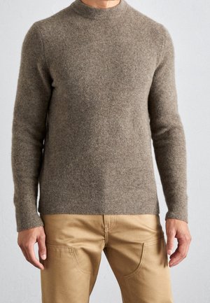 Stickad tröja - taupe