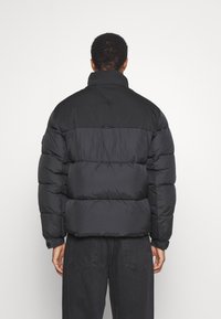 Tommy Hilfiger NEW YORK PUFFER JACKET - Giacca invernale - black