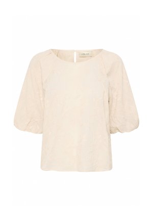 Blusa color crema con un motivo floreale testurizzato, scollatura rotonda e maniche corte a palloncino. Presenta un dettaglio a chiave sulla parte posteriore.