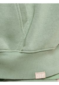 Sudadera con cremallera - green washed