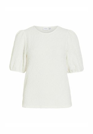 Blouse blanche texturée à manches courtes bouffantes et col rond, étiquetée "VILA" au col.