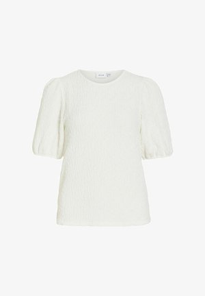 Blouse blanche texturée à manches courtes bouffantes et col rond, étiquetée "VILA" au col.