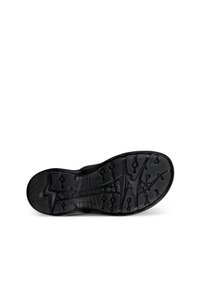 Semelle de chaussure en caoutchouc noir avec une surface texturée dotée de divers motifs de grip et de rainures pour l'adhérence, marquée du logo "ECCO".
