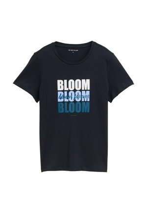 T-shirt en coton bleu marine à manches courtes et col rond. Présente un graphisme multicolore avec le mot "BLOOM" dans divers styles et tailles.