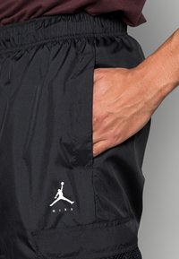Jordan SUIT PANT - Calças cargo - black