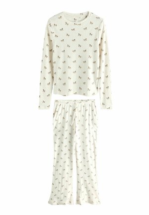 Ensemble de pyjama couleur crème avec un haut à manches longues et un pantalon imprimé de petits chevaux marron sur l'ensemble.