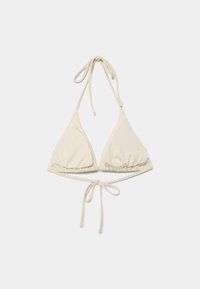 Haut de bikini triangle couleur crème avec liens au cou et dans le dos, présenté à plat sur un fond neutre.