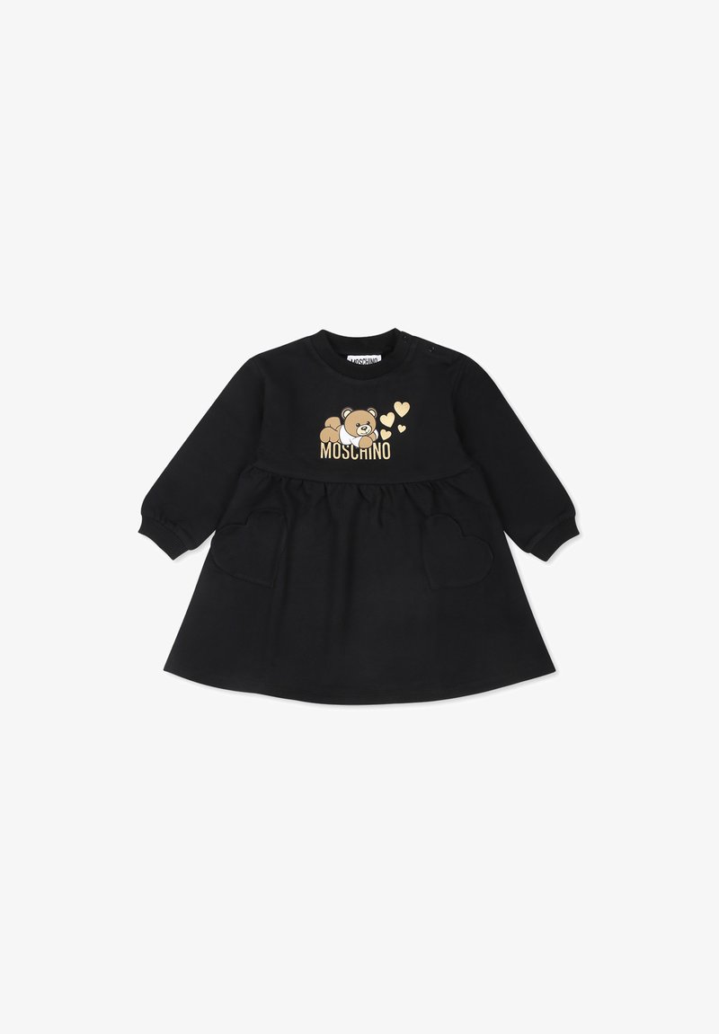Robe noire à manches longues avec un col rond, ornée d'un graphique d'ours et de cœurs dorés, taille élastique et poches en forme de cœur.