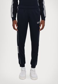 EA7 Emporio Armani PANTALONI - Träningsbyxor - blue