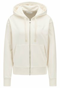 Sudadera blanca con cremallera hecha de tela suave, que cuenta con capucha ajustable, bolsillos frontales, puños acanalados y un discreto logo de la marca en el pecho.