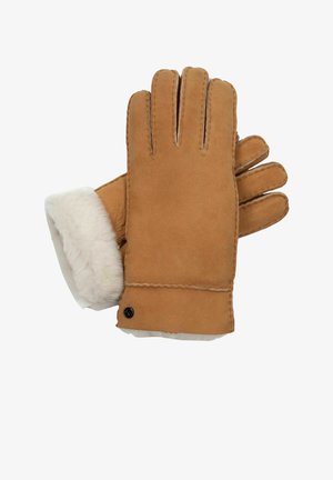 Brown leather gloves with white shearling lining at the cuff. Features five fingers, stitched detailing, and a small black accent button.