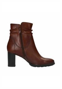 Bottine en cuir marron avec une surface texturée, fermeture éclair sur le côté et un talon carré. Caractéristiques d'un design souple en haut et d'un bout arrondi.