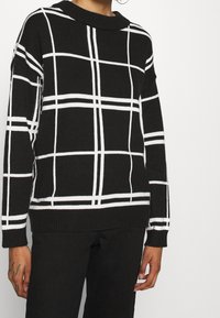Roxy Trui - black