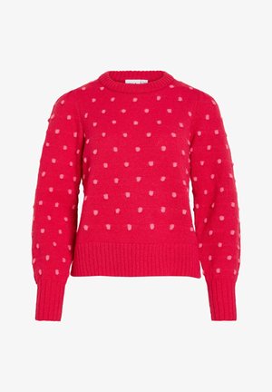 Raudonas megztinis su šviesiai rožinėmis taškuotomis dėmėmis, su ribb'dais rankogaliais, apačia ir apvalia apykakle.