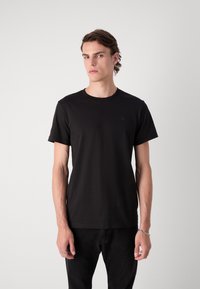 Calvin Klein Jeans TEXTURED MONOLOGO TEE - T-shirt med print - black