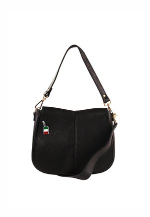 Black leather handbag with a textured finish, featuring a single adjustable strap and a small colored flag pendant detail.
