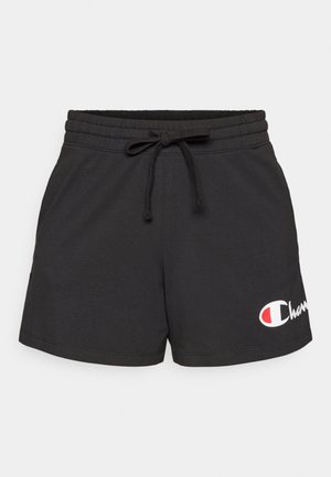 Sorte bomullsshorts med elastisk midjebånd og snøring. Har en hvit og rød logo på nedre venstre side. Glatt tekstur.