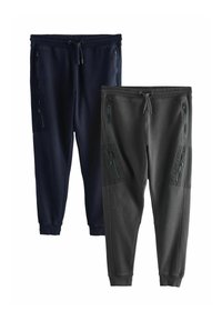 Dvi siaurėjančių džogerių poros, viena tamsiai mėlyna, kita anglies pilka, su užtrauktukais kišenėse ir raišteliais juosmenyje. Minkštos tekstūros audinys.