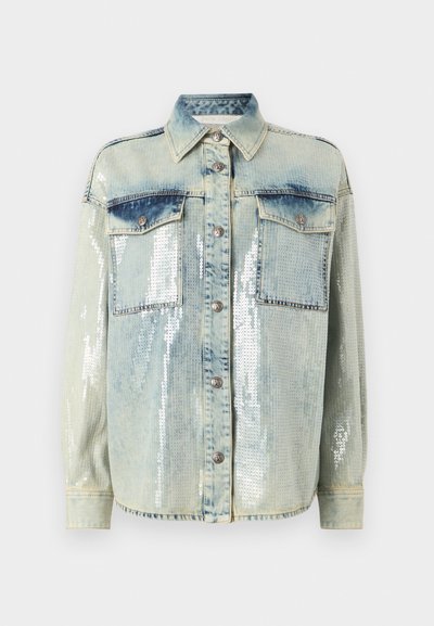 Light blue denim jacket with silver sequins, button front, two chest flap pockets, and long sleeves against a white background.