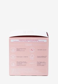Rosa pappkartong med certifiering för ekologisk kosmetik, som detaljerar hypoallergena, nickeltestade och återvinningsbara egenskaper.