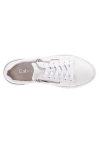 White leather sneakers with a smooth texture, featuring a lace-up front and two zipper accents on the sides. Interior shows brand name "Gabor."