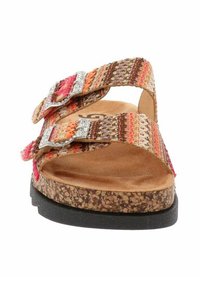 Sandales à lanières avec une tige tissée multicolore et des boucles en argent, dotées d'une semelle en liège et d'une semelle intérieure texturée marron.