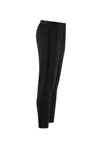 Schwarze Sporthosen mit elastischem Bund, seitlichen Mesh-Einsätzen und dezenten Knopfdetails entlang des unteren Beins. Hergestellt aus leichtem Stoff.