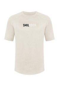 Camiseta atlética de manga corta color beige claro con una tela texturizada, que presenta un logo en blanco y negro de "SMILODOX" en el pecho.