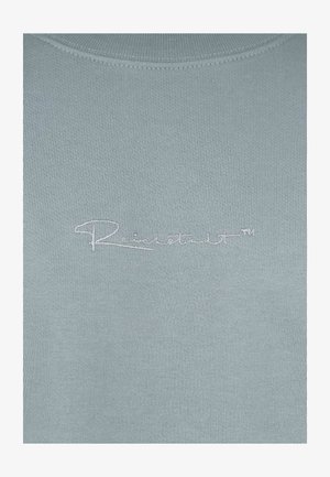 Felpa a costine di colore azzurro chiaro con un sottile logo ricamato in bianco, girocollo e tessuto strutturato.