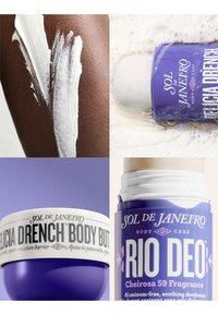 Crème appliquée sur peau foncée, pot violet de beurre corporel Sol de Janeiro, et stick déodorant violet Rio Deo avec mousse.