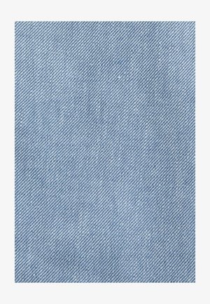 Light blue denim fabric with a smooth texture, featuring a twill weave pattern and subtle flecks throughout.