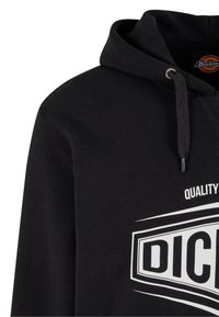 Black hoodie made of soft fabric featuring a large white logo on the front and adjustable drawstrings at the neckline.
