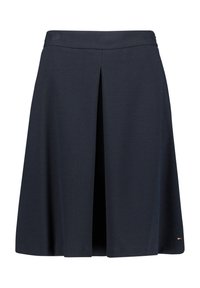 Tummansininen polviin asti ulottuva hame, jossa on edessä keskellä laskos ja hienovarainen tekstiilikuosi, pieni logo helman oikealla puolella.