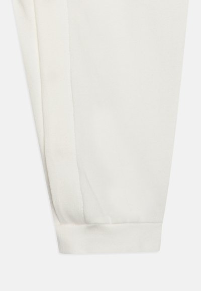 Bílé bavlněné jogger kalhoty s manžetou, hladkým povrchem a bočním švem pro přiléhavý design.