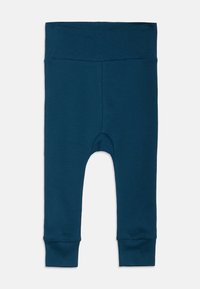 Leggings de color azul marino confeccionados con una tela suave y elástica, que cuentan con una cintura alta, puños ajustados y una textura lisa.