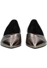 Metallic bronze flat shoes with pointed toe, smooth texture, and black interior. Features a low profile and no visible embellishments.