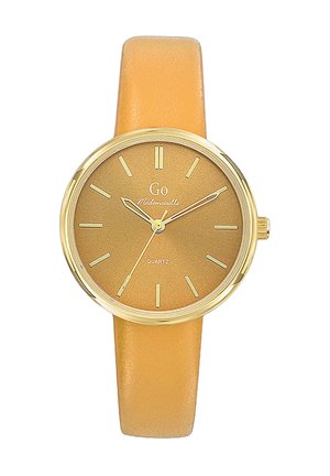 Montre en quartz au ton doré présentant un cadran rond avec un cadran texturé doré, des marquages horaires minimaux et un bracelet en cuir jaune doux.