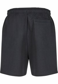 Schwarze Shorts mit elastischem Bund und einer hinteren Tasche. Hergestellt aus leichtem Stoff, mit glatter Textur und geraden Beinen.