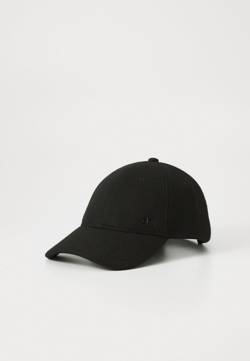 Black baseball cap made of felt material with a curved visor and embroidered logo on the front. Simple design with six-panel construction.