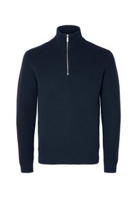 Marinblått stickat tröja med hög krage och halvdragkedjestängning. Ribbad manschetter och nederkant med en strukturerad tyg.