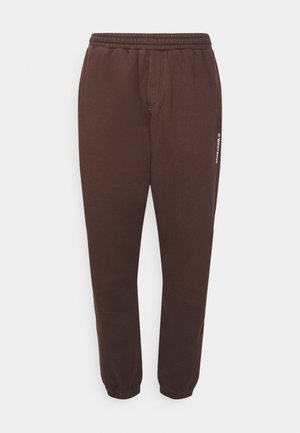 CARLTON UNISEX - Tracksuit bottoms - plum