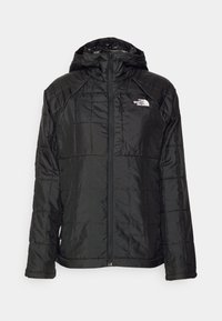 Veste matelassée noire avec capuche, fermeture éclair intégrale à l'avant et logo The North Face sur la partie supérieure gauche de la poitrine.