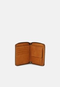 Tan leather wallet with a zip closure, featuring multiple card slots and a pocket. Soft texture with a smooth inner lining.