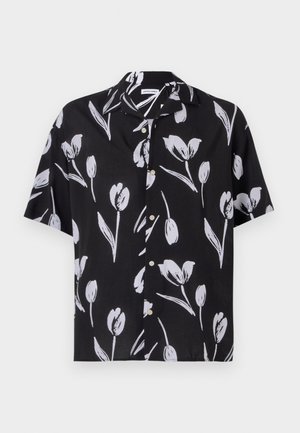 Short-sleeved black shirt with white tulip print, featuring a button-down front and relaxed fit. Made of lightweight fabric with a smooth texture.